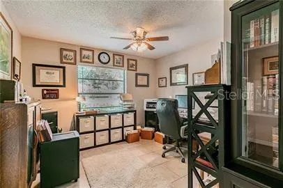 a view of a livingroom with furniture and a flat screen tv