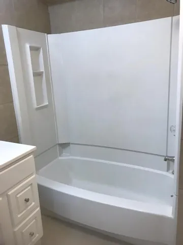 a bathroom with a bathtub