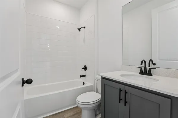 a bathroom with a sink and a toilet