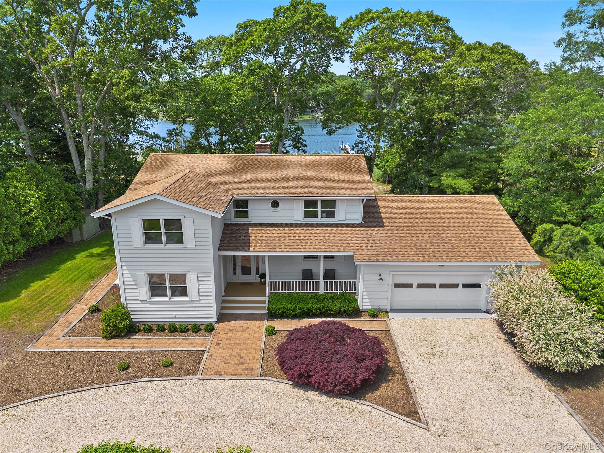 Newly renovated waterfront with deepwater dock and opens to Peconic Bay