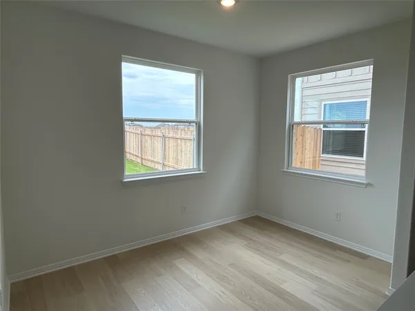 a bathroom with a sink a mirror and a toilet