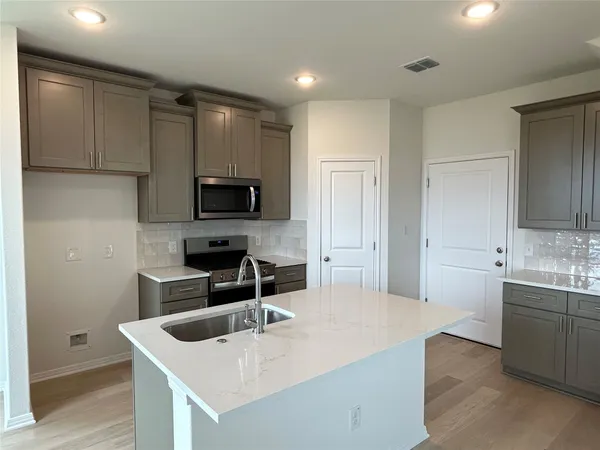 a view of a swimming pool with a garden