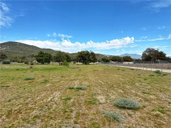 a view of lake with mountain