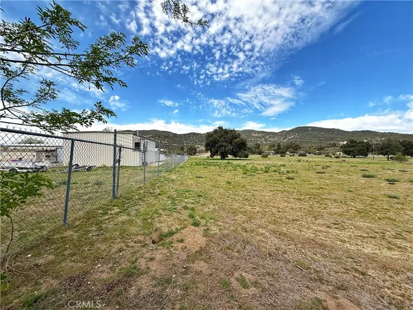 a view of an outdoor space and mountains