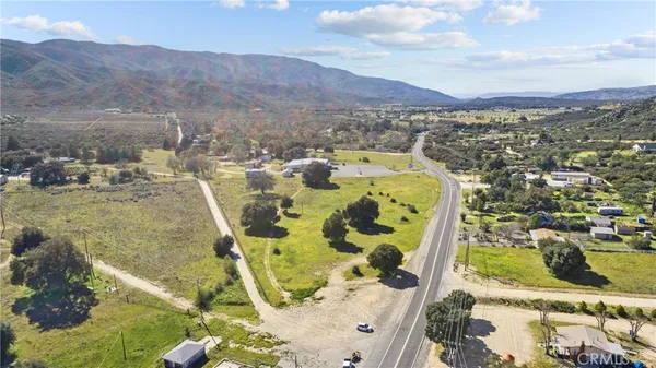 a view of an swimming pool with a yard