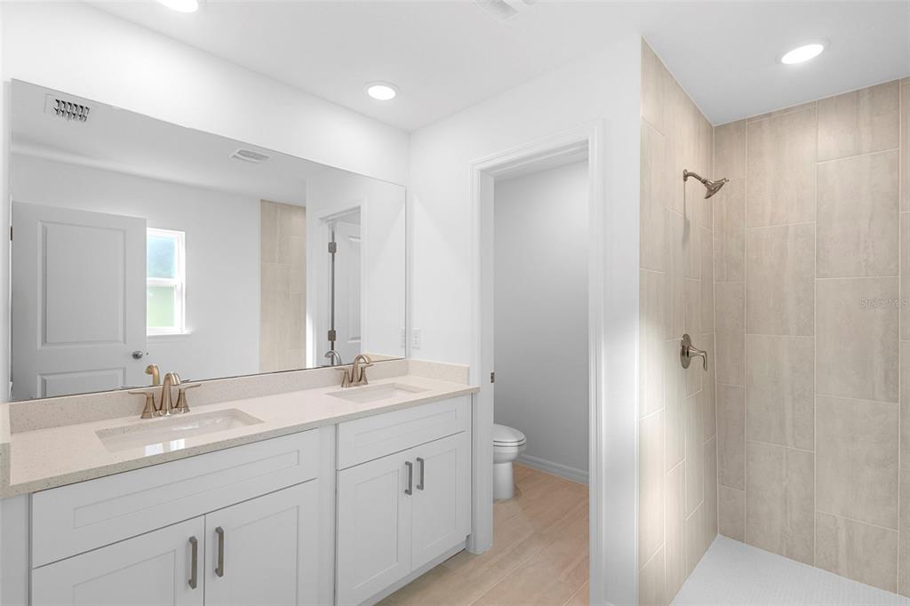 2264 Suanee Eustis, FL 32726 - Photo 22 of 37 a bathroom with 2 sink tub and a mirror