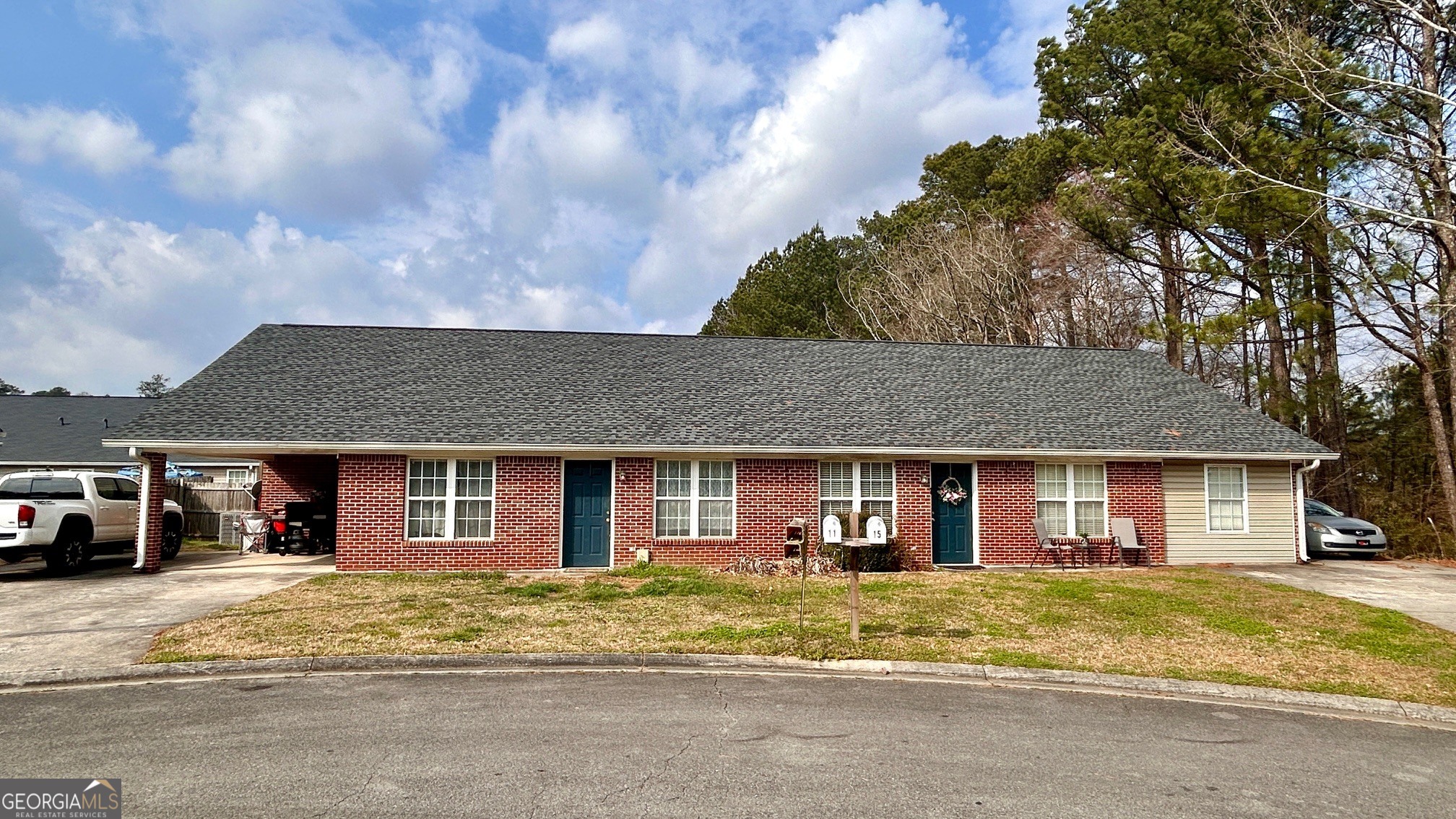 11-15 Pintail Court Rome, GA 30165 - Photo 1 of 1 a view of a brick house with a large windows