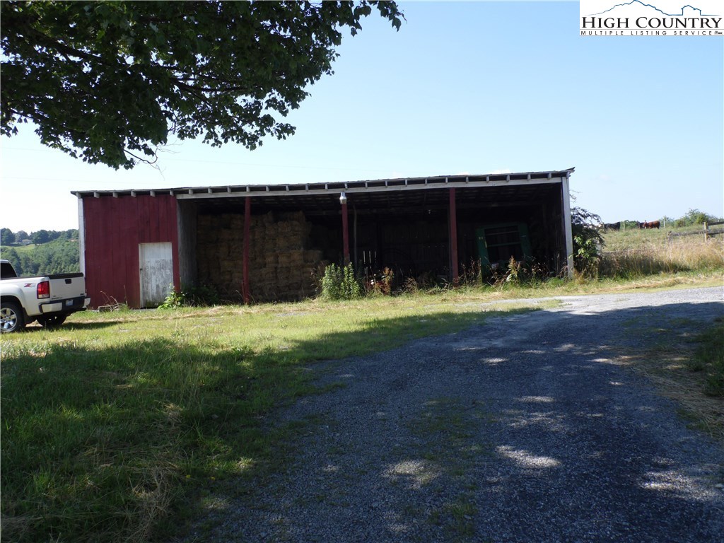1032 Wagoner Ridge Road Ennice, NC 28623 - Photo 7 of 23 a view of a backyard of the house