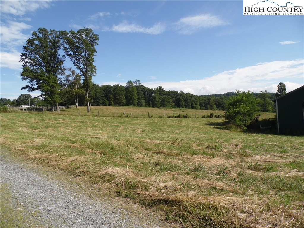 1032 Wagoner Ridge Road Ennice, NC 28623 - Photo 10 of 23 a view of an outdoor space and a yard