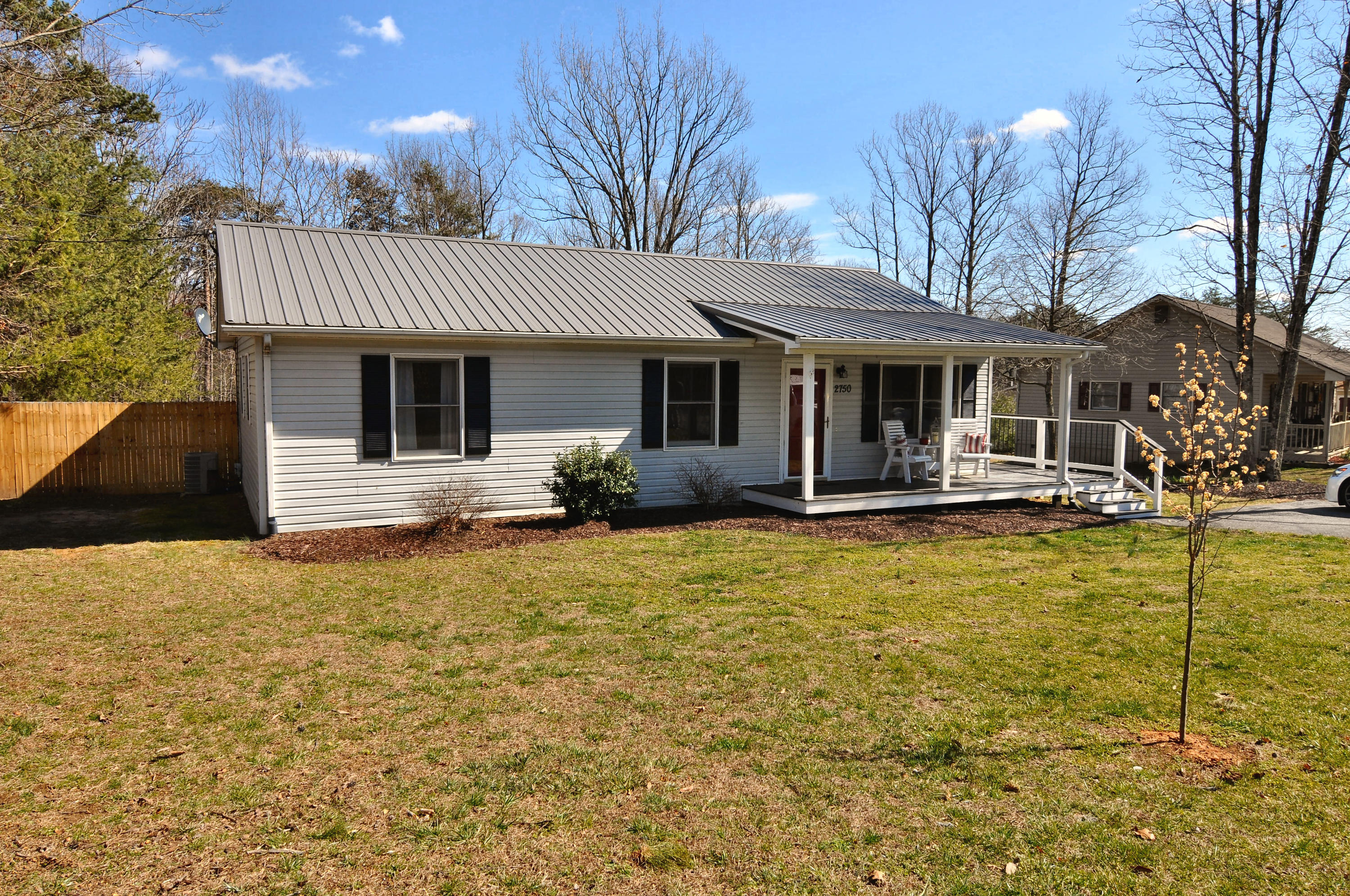 2750 Sandy Level Road Goodview, VA 24095 - Photo 2 of 20 a front view of a house with garden