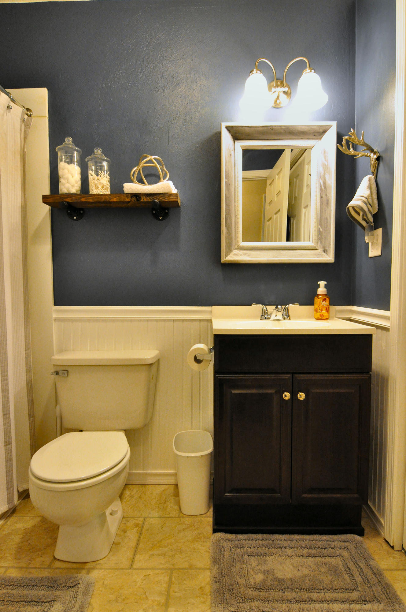 2750 Sandy Level Road Goodview, VA 24095 - Photo 17 of 20 a bathroom with a toilet sink and mirror