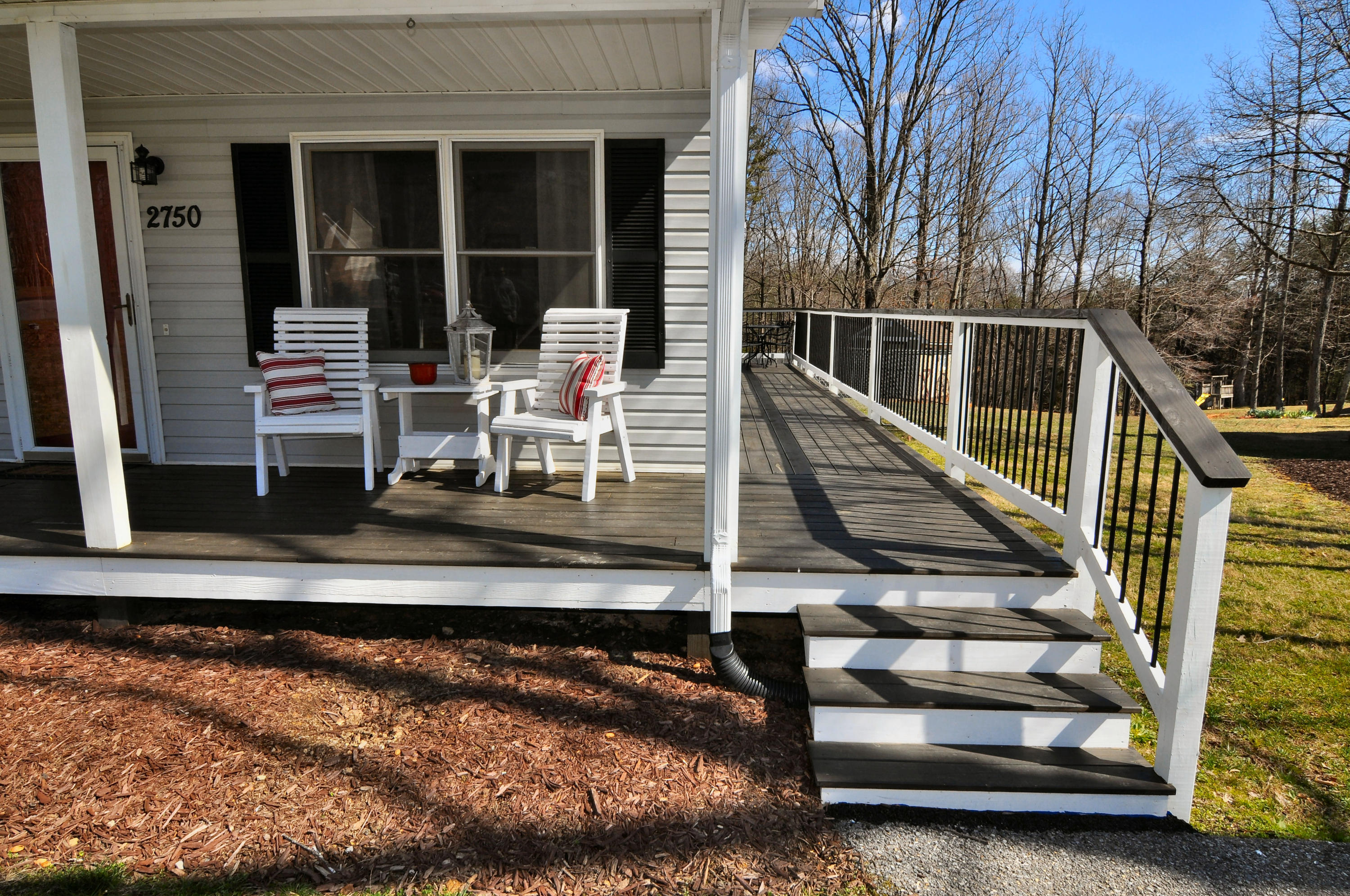 2750 Sandy Level Road Goodview, VA 24095 - Photo 3 of 20 a view of balcony with two chairs and a table