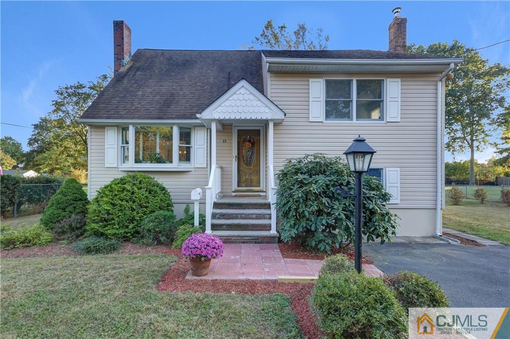 73 Ramsey Road Middlesex, NJ 08846 - Photo 1 of 25 a front view of a house with a garden
