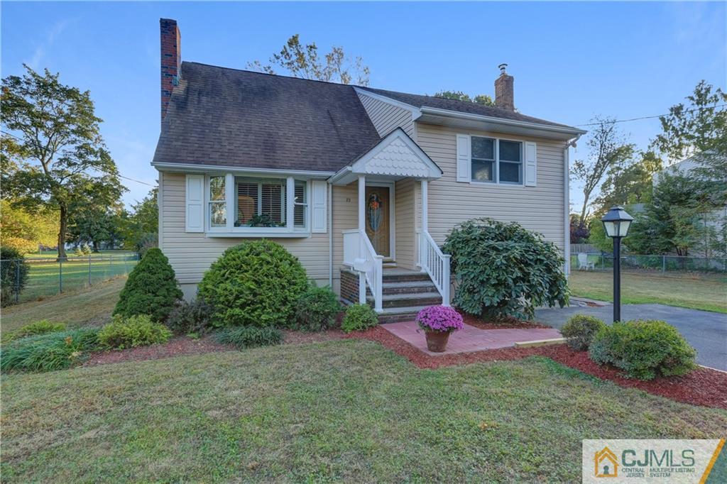 73 Ramsey Road Middlesex, NJ 08846 - Photo 2 of 25 a front view of a house with a yard