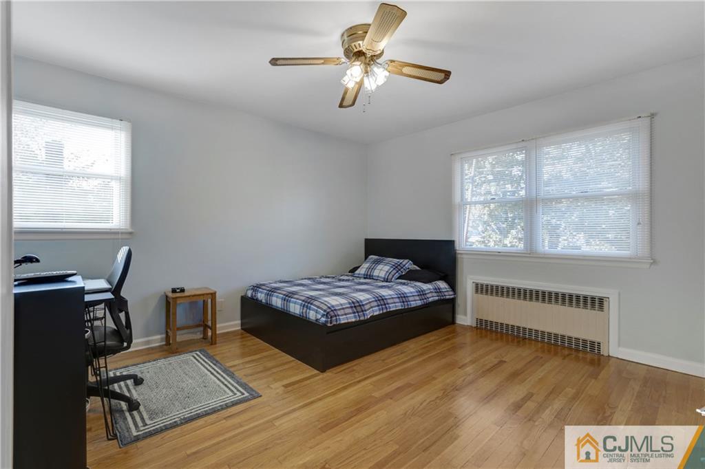 73 Ramsey Road Middlesex, NJ 08846 - Photo 22 of 25 a bedroom with bed and a window