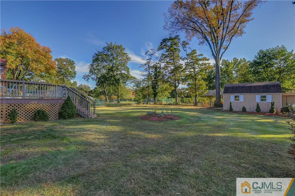 73 Ramsey Road Middlesex, NJ 08846 - Photo 6 of 25 a view of a house with a yard
