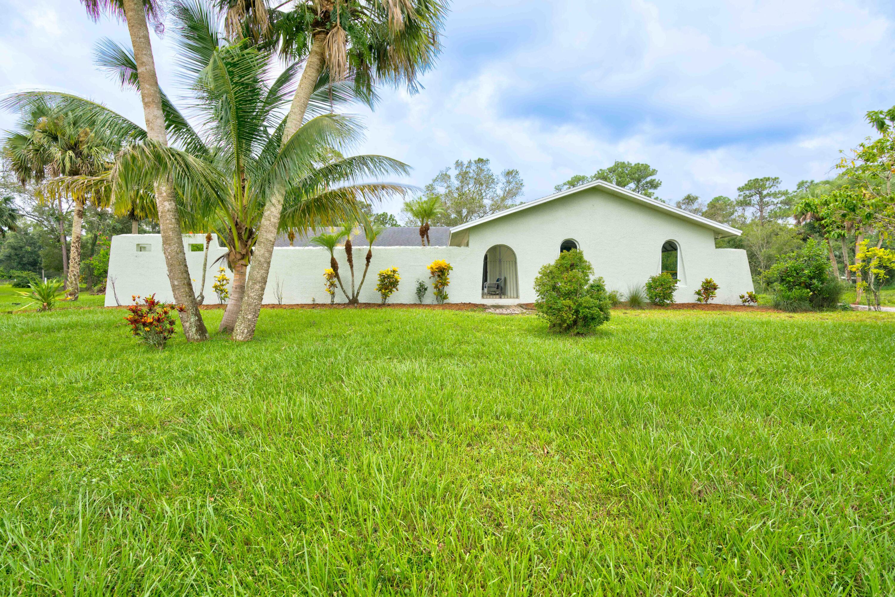 10046 175th Road North Jupiter, FL 33478 - Photo 1 of 66 02__mlp2460_1_2_3_4-edit