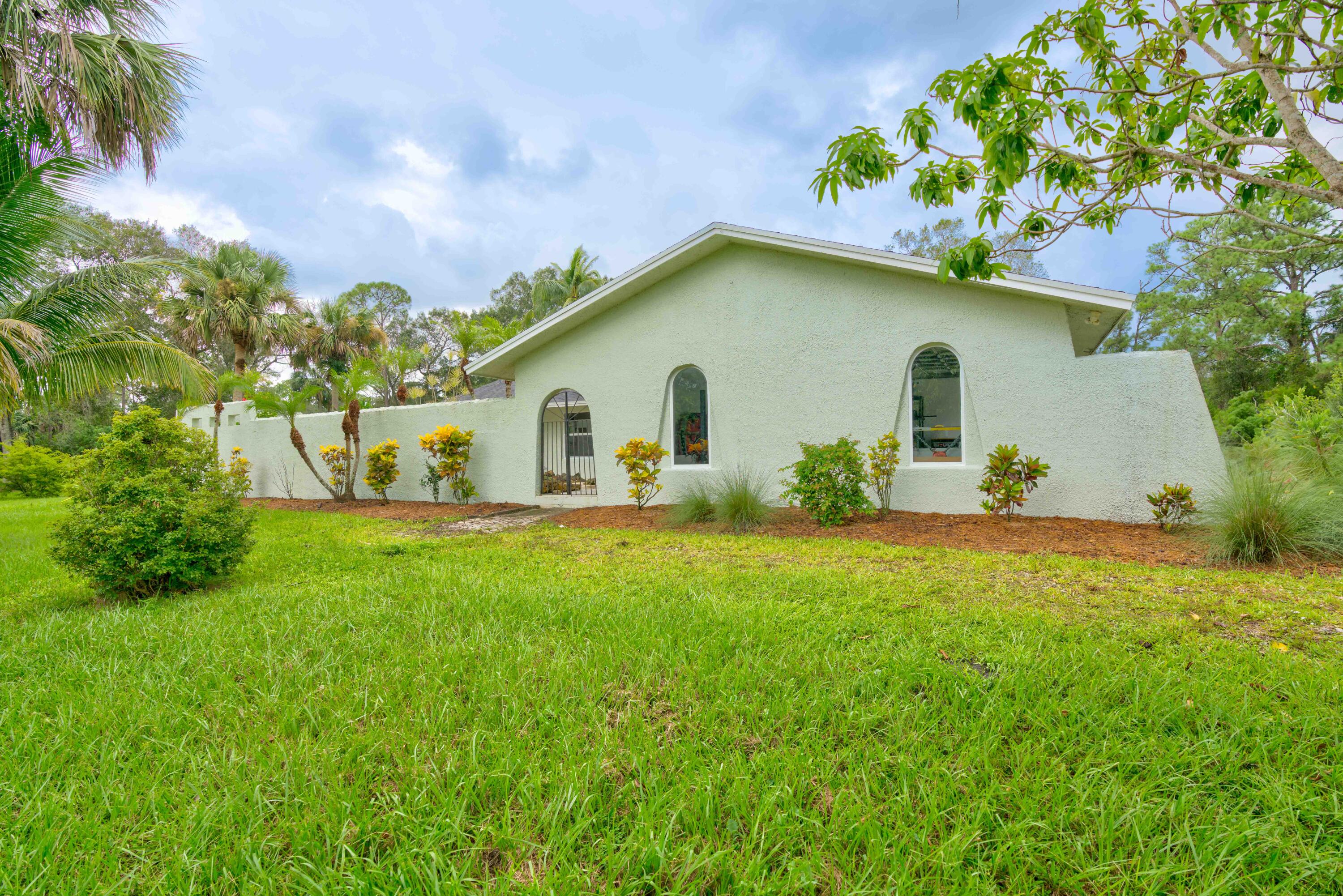 10046 175th Road North Jupiter, FL 33478 - Photo 2 of 66 03__mlp2455_6_7_8_9-edit