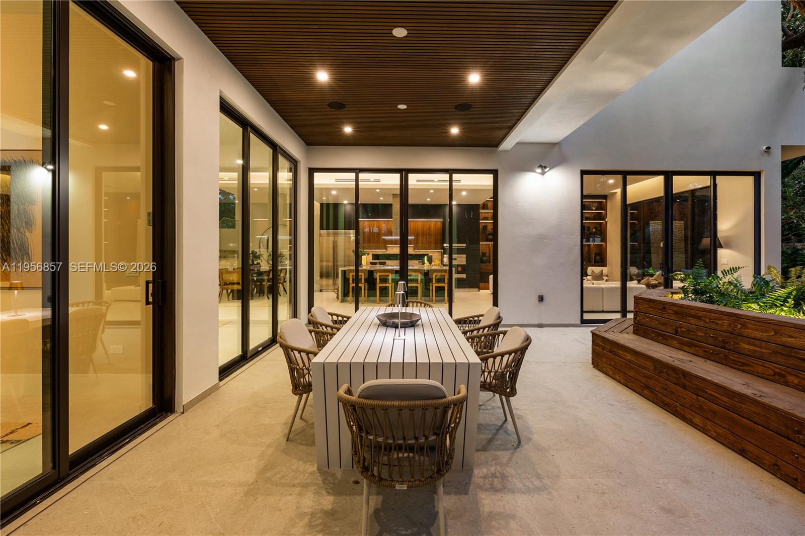2805 Freeman Street Miami, FL 33133 - Photo 26 of 92 a very nice looking dining room with a large window with outer view