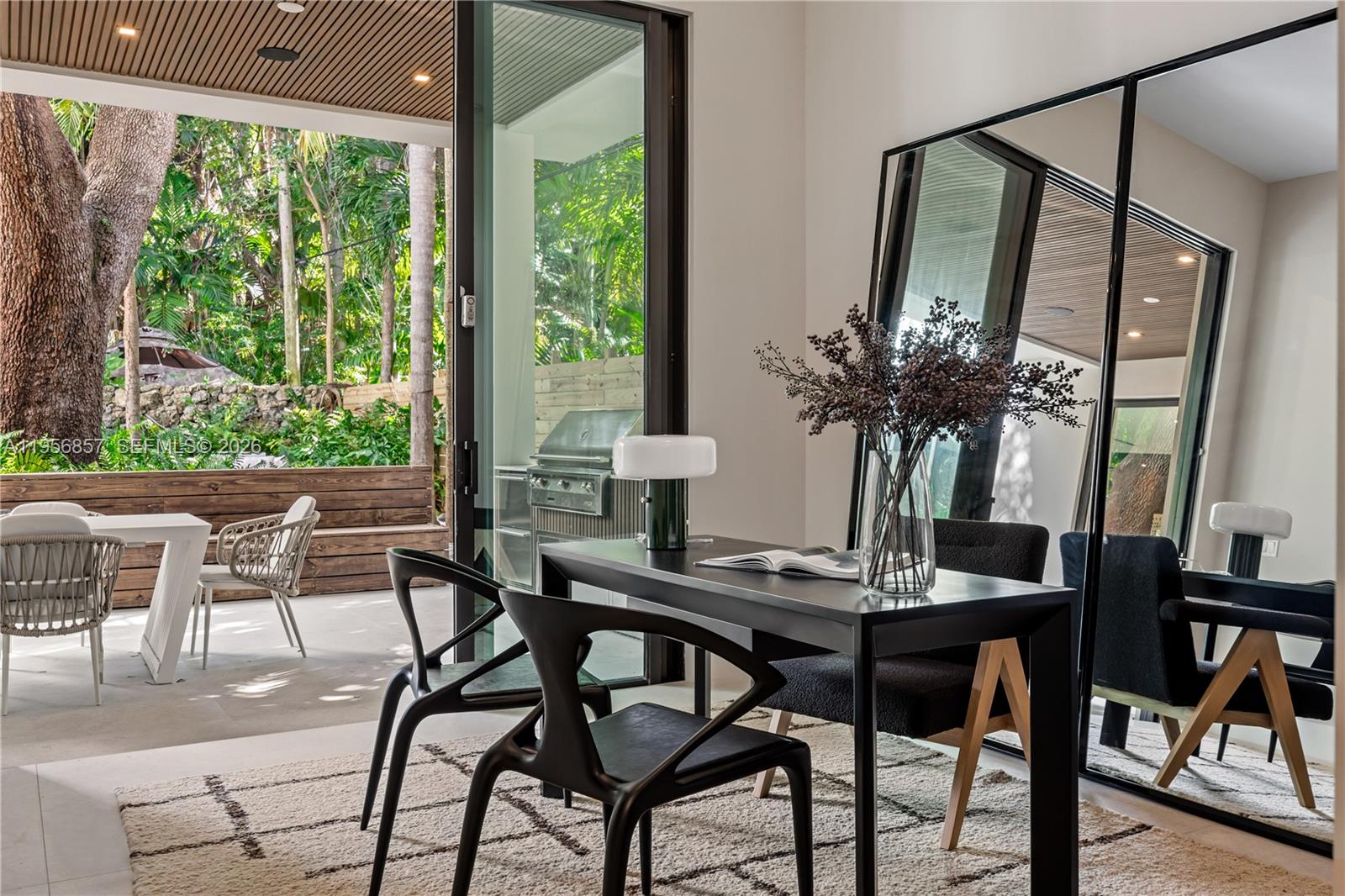 2805 Freeman Street Miami, FL 33133 - Photo 75 of 92 a view of a dining room with furniture and window