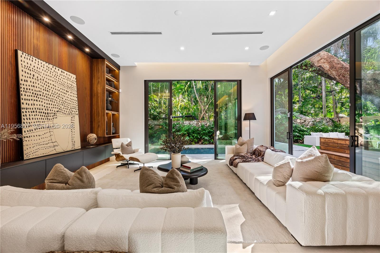 2805 Freeman Street Miami, FL 33133 - Photo 80 of 92 a living room with furniture and large windows