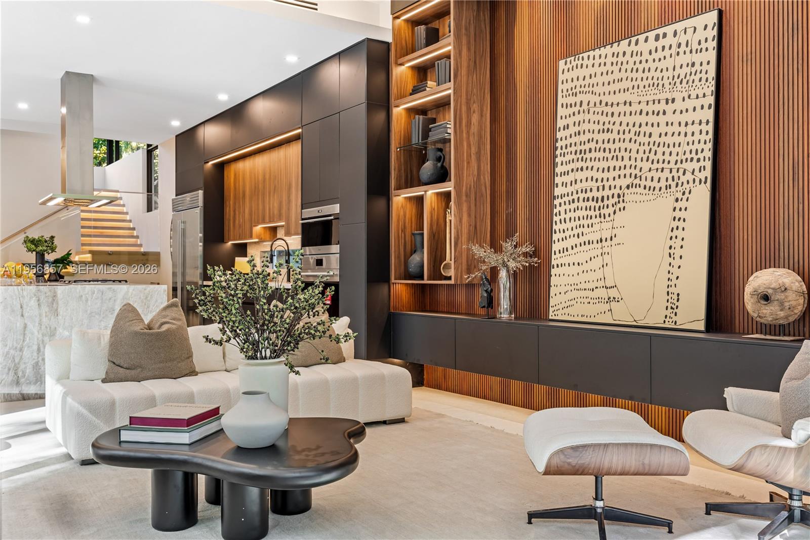 2805 Freeman Street Miami, FL 33133 - Photo 81 of 92 a living room with furniture and a potted plant