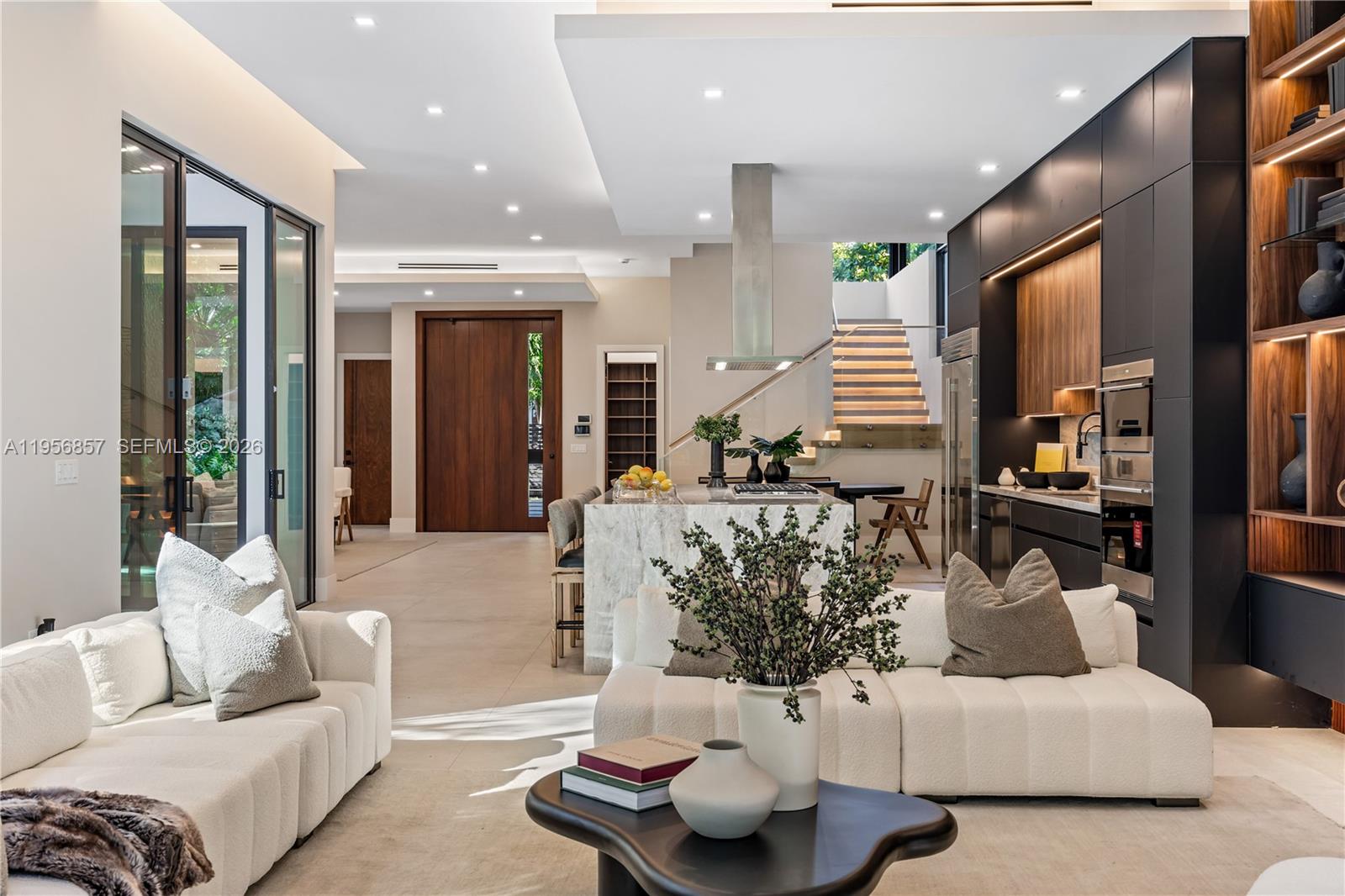 2805 Freeman Street Miami, FL 33133 - Photo 82 of 92 a living room with furniture and a large window
