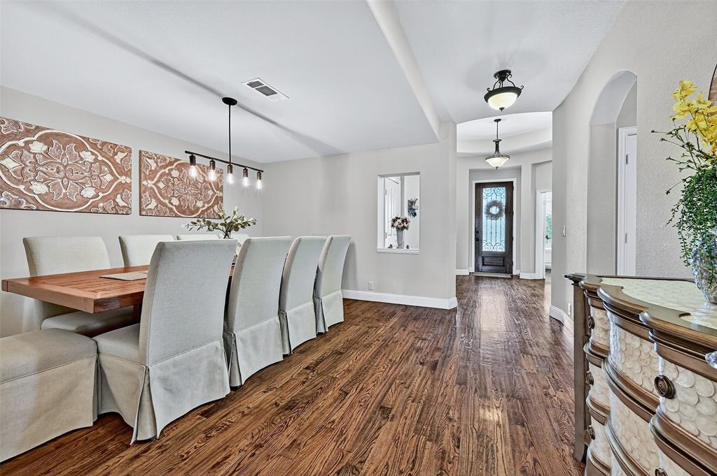 910 Calder Court Anna, TX 75409 - Photo 13 of 37 a living room with furniture and wooden floor