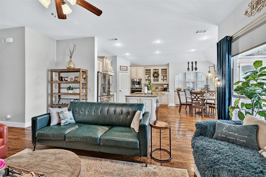 910 Calder Court Anna, TX 75409 - Photo 19 of 37 a living room with furniture and a couch
