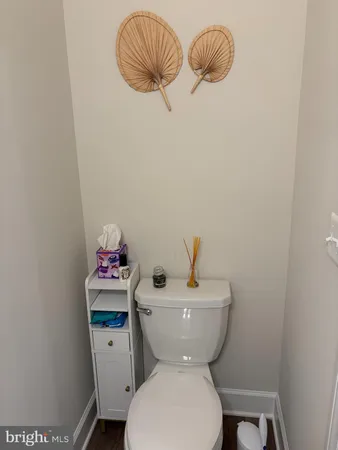 a bathroom with a toilet and a sink