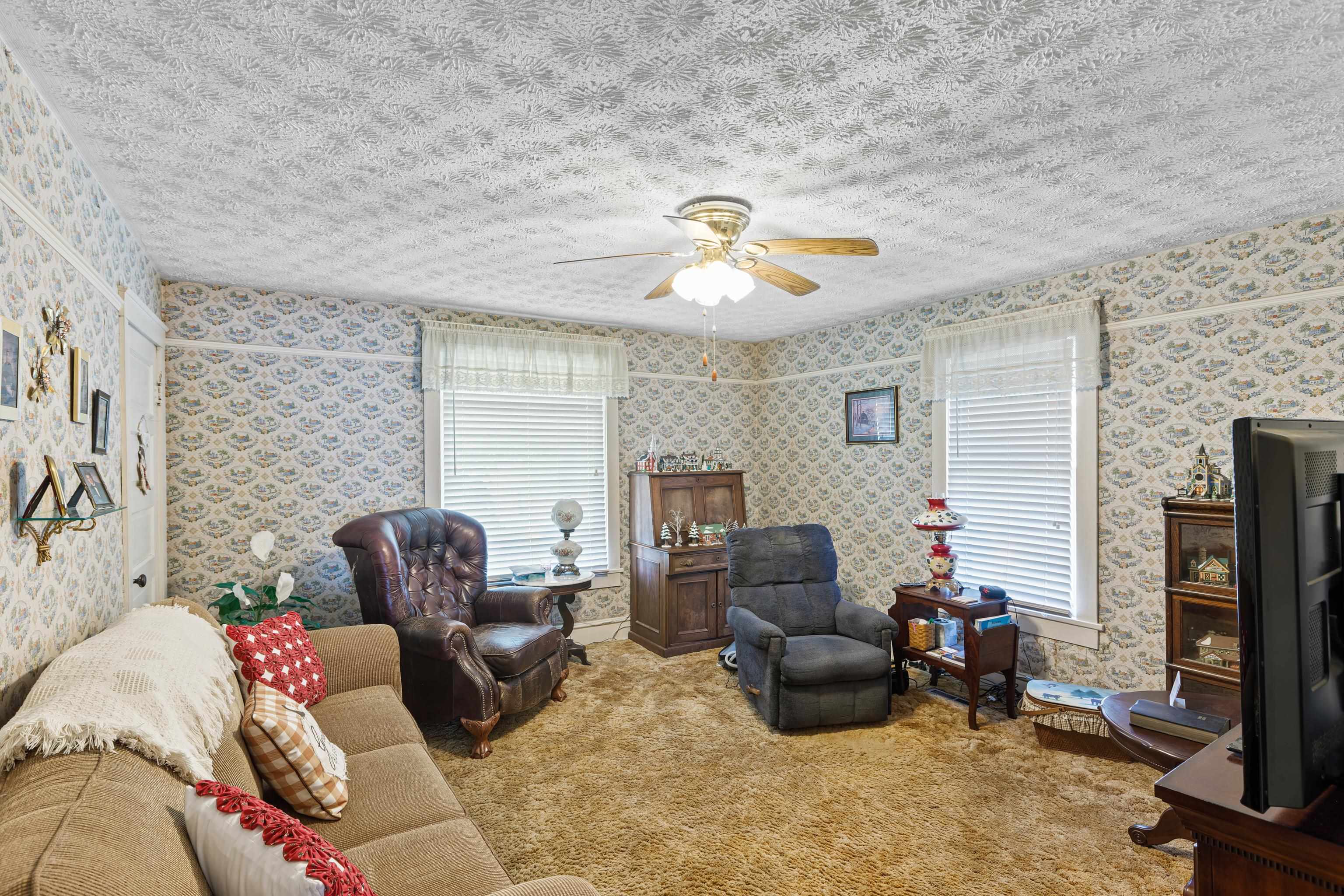 344 Free Mason Run Road Mount Solon, VA 22843 - Photo 31 of 45 a living room with furniture and a flat screen tv