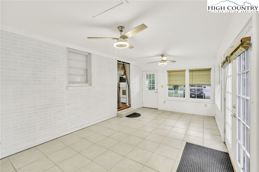 117 Andrews Ridge Road Sparta, NC 28675 - Photo 11 of 49 a view of an empty room with a window
