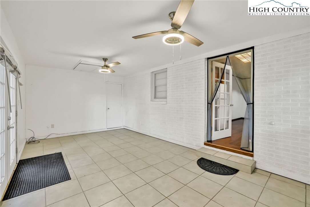 117 Andrews Ridge Road Sparta, NC 28675 - Photo 12 of 49 an empty room with mirror