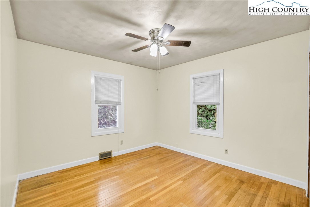 117 Andrews Ridge Road Sparta, NC 28675 - Photo 23 of 50 a view of an empty room with a window
