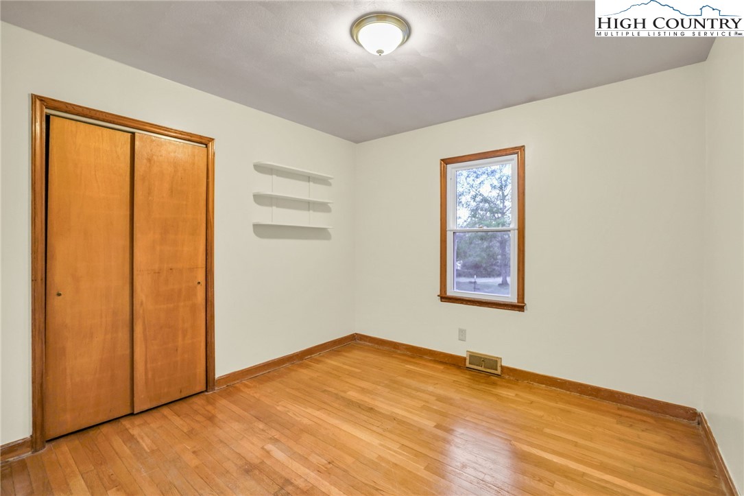 117 Andrews Ridge Road Sparta, NC 28675 - Photo 26 of 49 a view of an empty room with a window