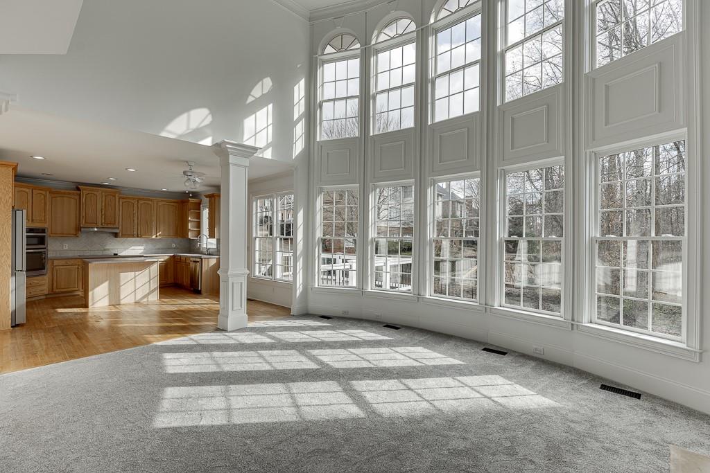 2747 Pathview Drive Dacula, GA 30019 - Photo 18 of 59 a living room with a large window