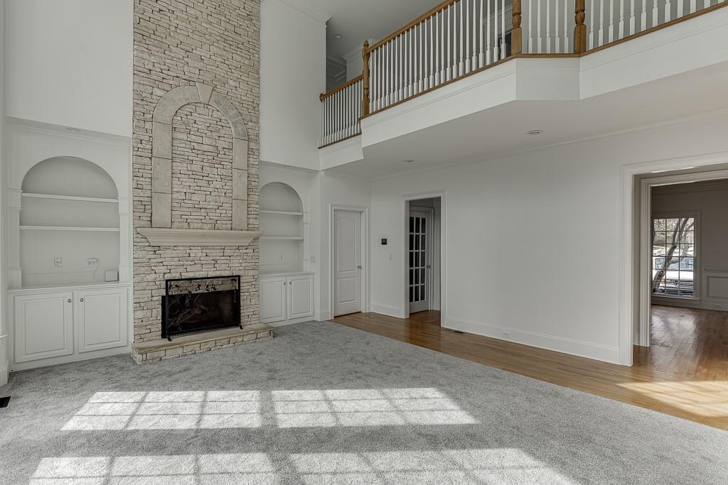 2747 Pathview Drive Dacula, GA 30019 - Photo 20 of 59 a view of an empty room fire place and a fireplace