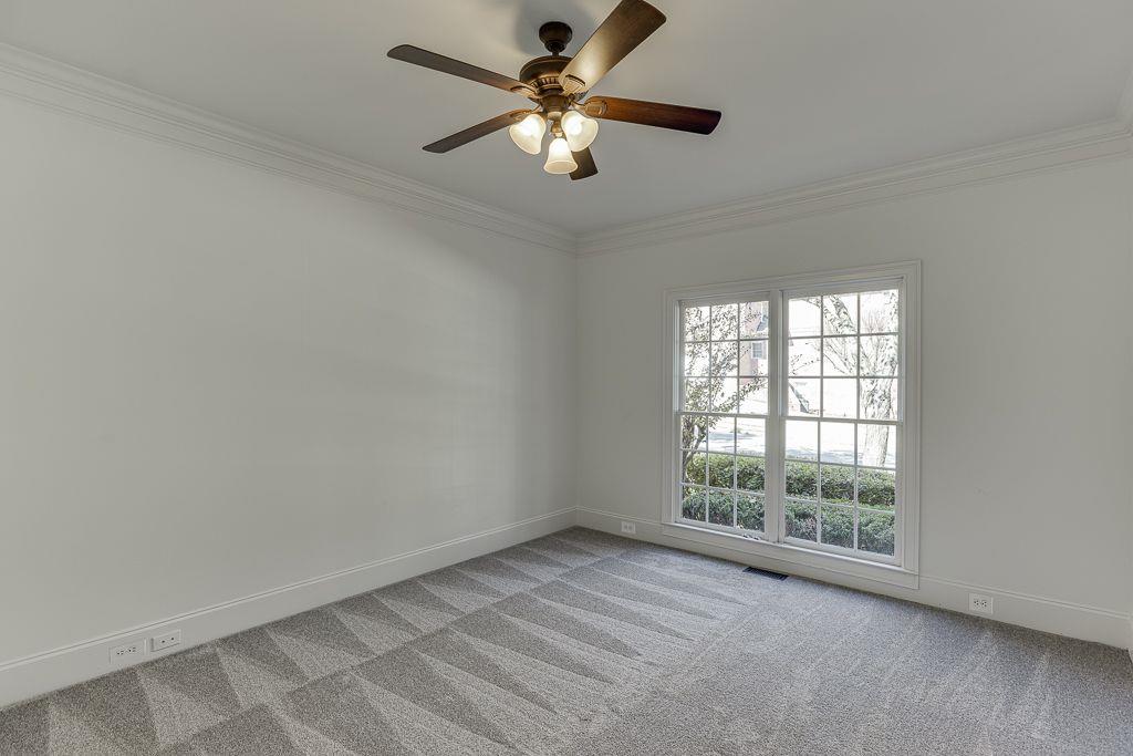 2747 Pathview Drive Dacula, GA 30019 - Photo 22 of 59 wooden floor in an empty room with a window