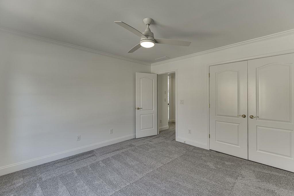 2747 Pathview Drive Dacula, GA 30019 - Photo 28 of 59 a view of an empty room