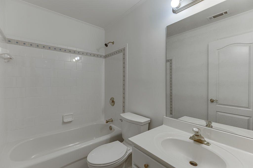 2747 Pathview Drive Dacula, GA 30019 - Photo 29 of 59 a bathroom with a sink toilet and shower