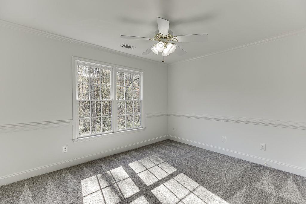 2747 Pathview Drive Dacula, GA 30019 - Photo 30 of 59 wooden floor in an empty room with a window