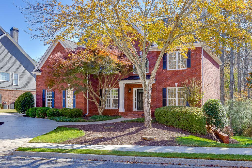 2747 Pathview Drive Dacula, GA 30019 - Photo 3 of 59 a front view of house with yard and green space