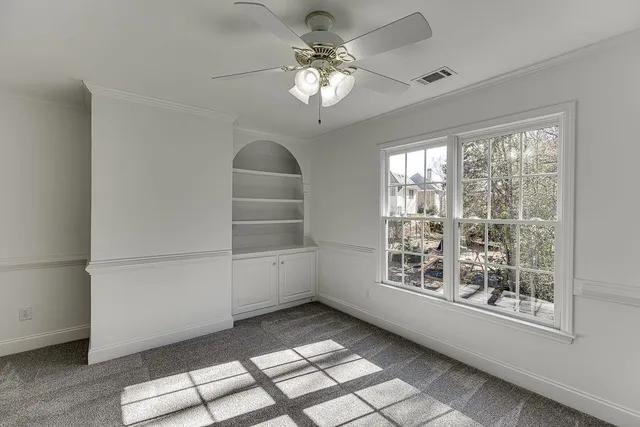 an empty room with windows