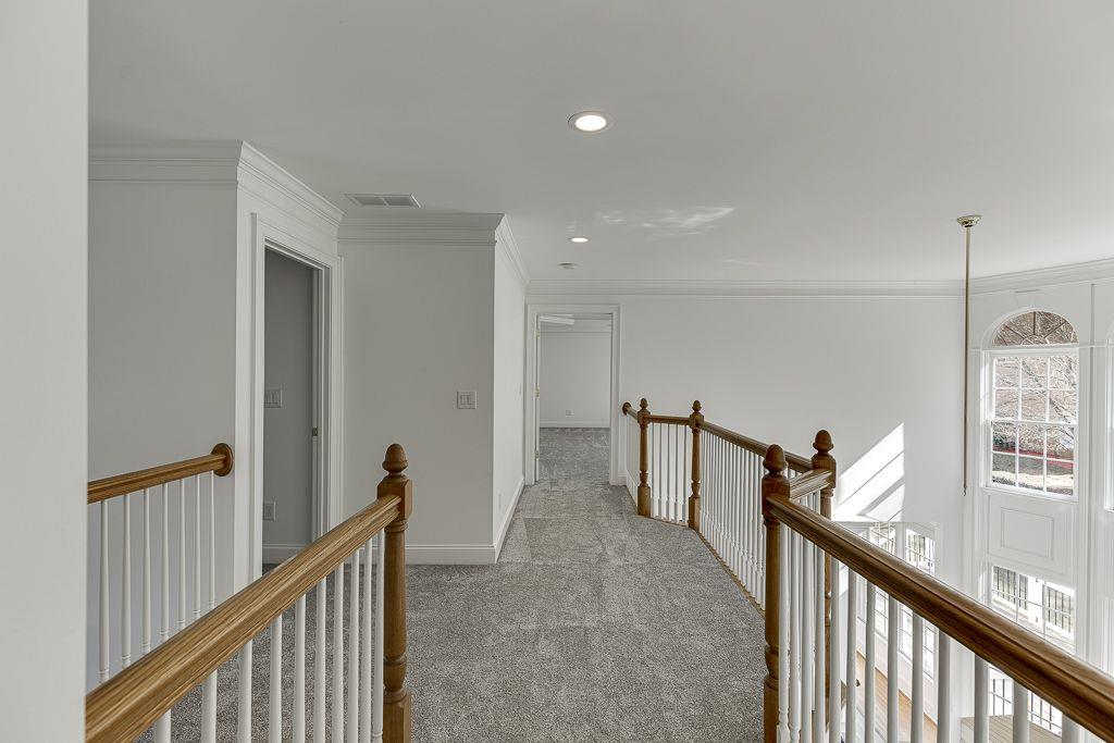 2747 Pathview Drive Dacula, GA 30019 - Photo 33 of 59 a view of a hallway with seating area