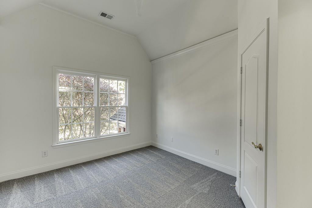 2747 Pathview Drive Dacula, GA 30019 - Photo 34 of 59 an empty room with windows