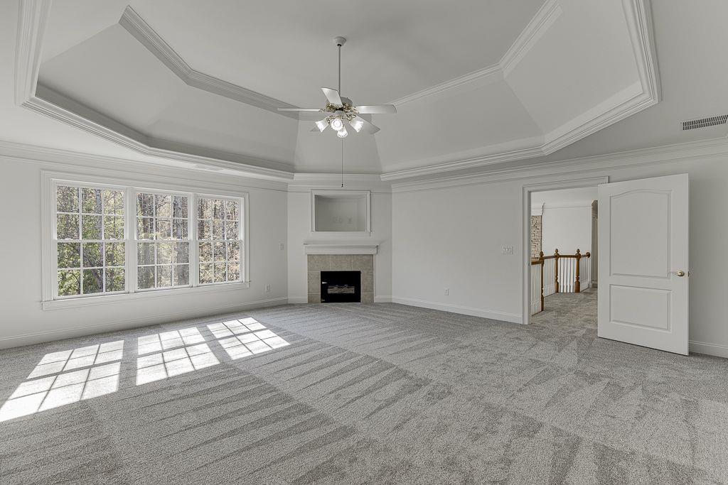 2747 Pathview Drive Dacula, GA 30019 - Photo 39 of 59 a view of an empty room with a window and fireplace