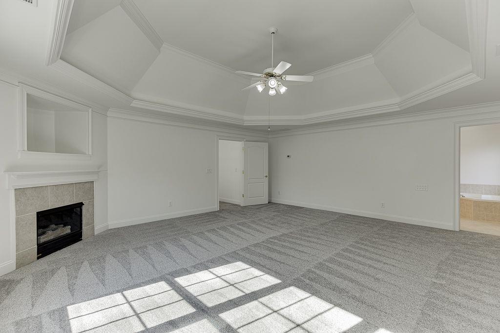 2747 Pathview Drive Dacula, GA 30019 - Photo 40 of 59 a view of empty room with wooden floor and fireplace