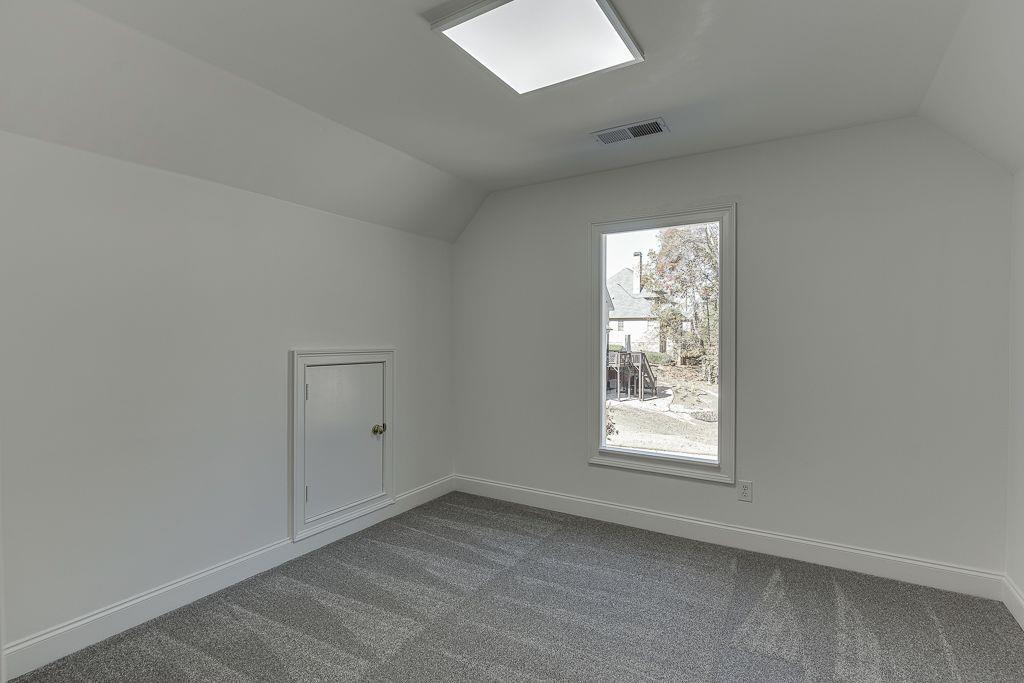 2747 Pathview Drive Dacula, GA 30019 - Photo 45 of 59 an empty room with a window