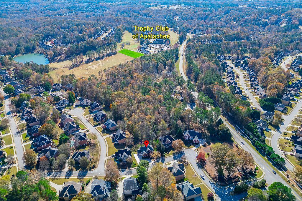 2747 Pathview Drive Dacula, GA 30019 - Photo 58 of 59 an aerial view of a houses with a yard