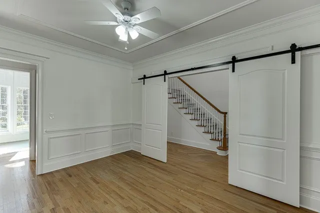 a view of entryway with wooden floor